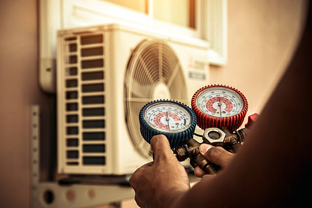 Professional Hvac Maintenance technician working in Clinton, MA